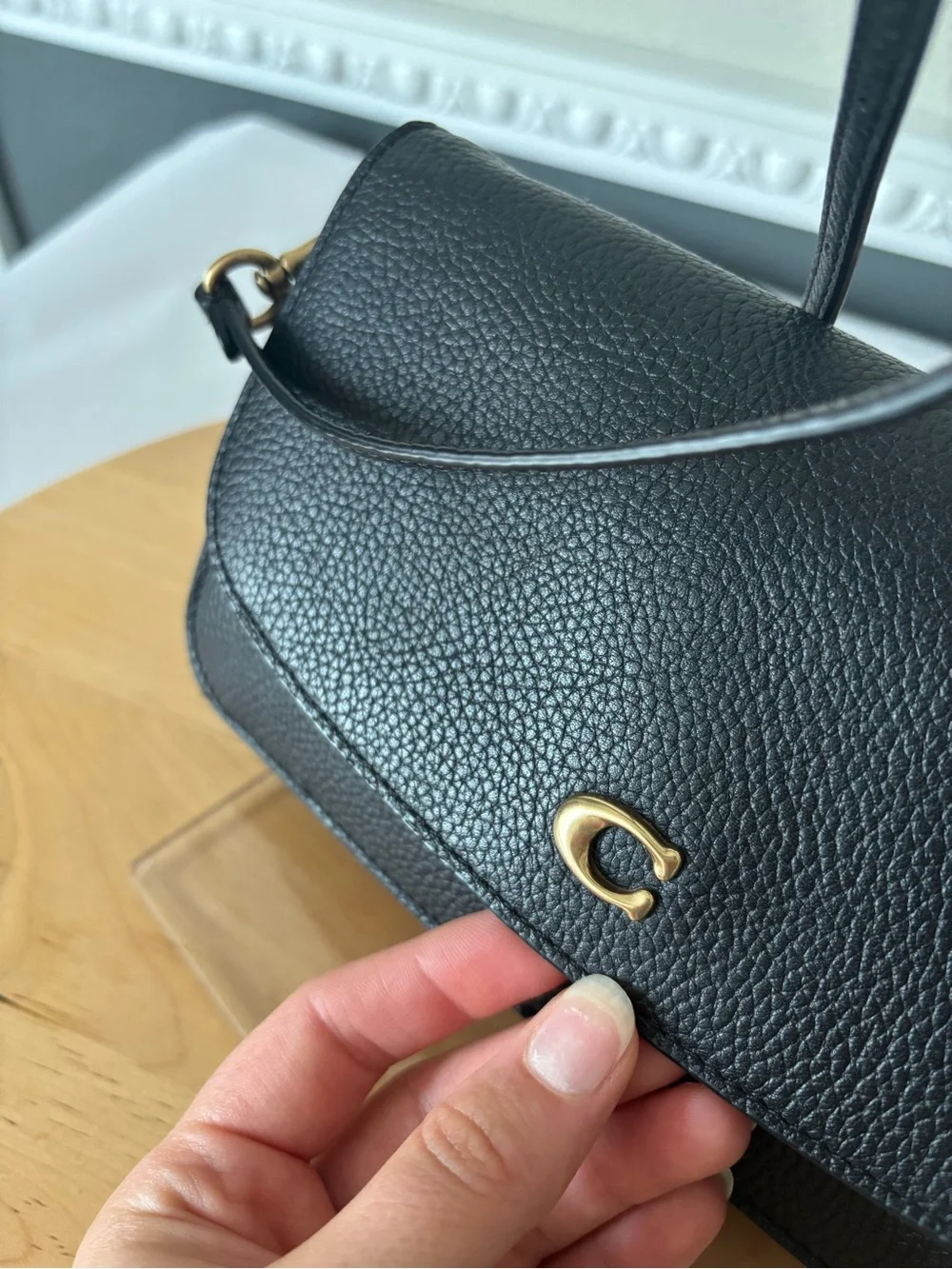 Coach compact pebbled